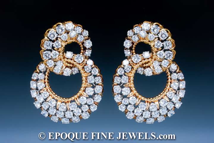 An impressive pair of 18 karat gold and diamond earrings